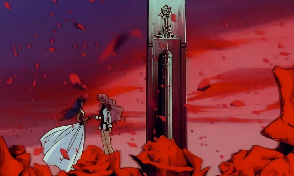 Utena e Anthy, à esquerda, meio a um campo de rosas com pétalas esvoaçantes em um fim de tarde no anime "Shoujo Kakumei Utena".