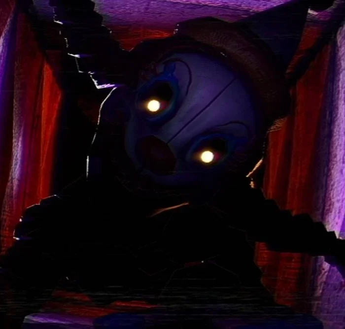O Mimic de "Five Night's at Freddy" dando um jumpscare no jogador.