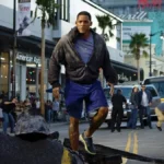 Avatar: Seven Havens | Nickelodeon Anúncia Continuação de Lenda de Aang e Korra Will Smith flutuando como o herói protagonista de "Hancock" (2008), na rua, com o asfalto estourado ao fundo fruto de um confronto.