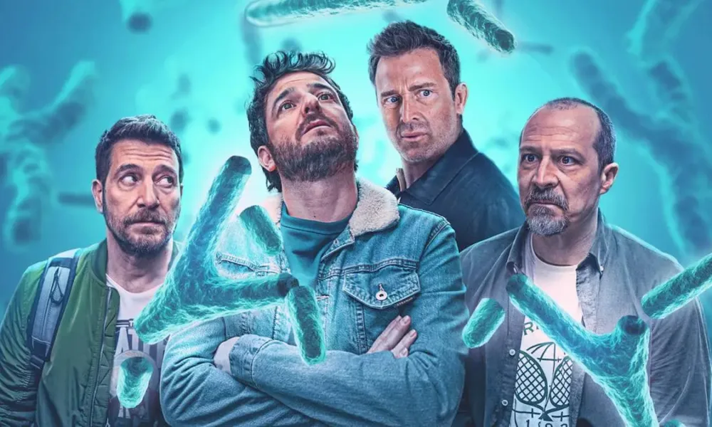 Imagem promocional da série espanhola, pela Netflix, "Machos Alpha". Protagonistas olham confusos cromossomos gigantes ao seu redor em um fundo azul e destaque para cromossomos Y.