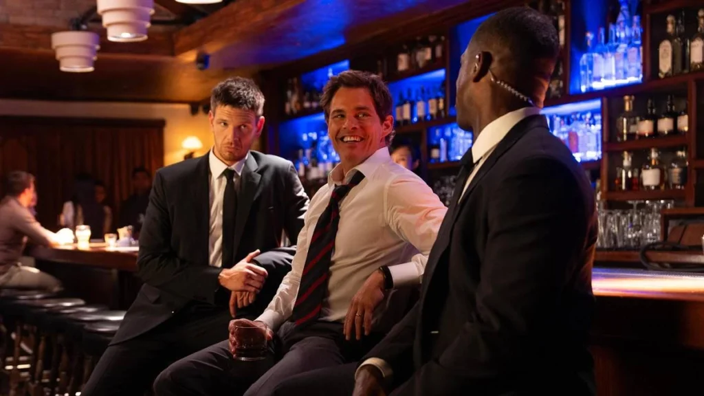Paradise (2025) | Conspirações, Drama e Alteração da Realidade 1 Time de agentes da série "Paradise" em um bar.