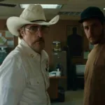 Protagonistas de "Eddington" em um escritório.