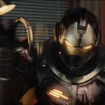 A sucessora do Homem de Ferro, Ironheart, Dominique Thorne como Riri Williams no trailer de sua série. Imagem com ela com a armadura completa.