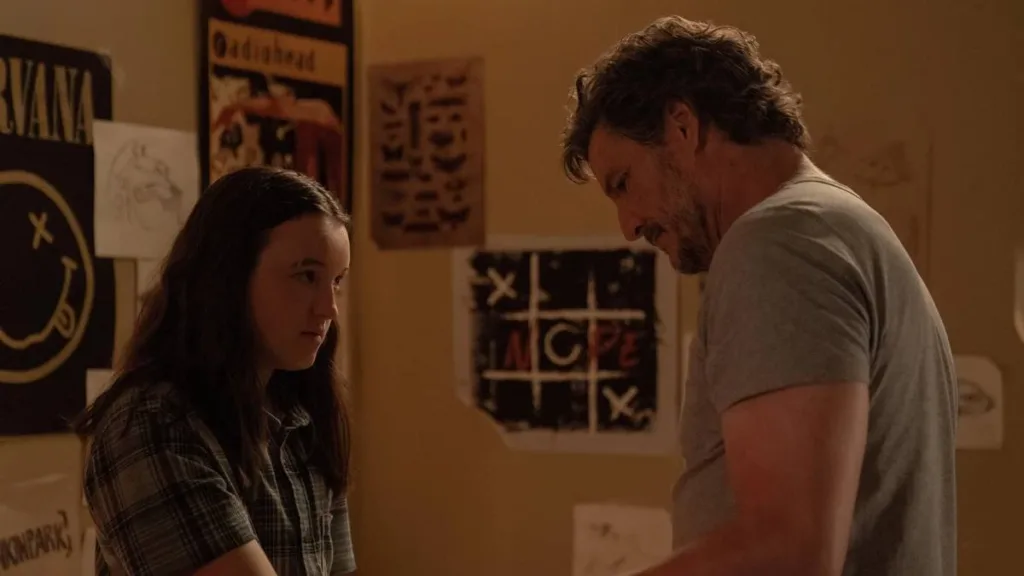 Ellie, esquerda, de cabelos longos, e Joel, direita, no sexto episódio da segunda temporada de The Last of Us. Cena se passa em flashback na adolescência no quarto de Ellie, ambos parecem estar desconfortáveis, mas querendo se aproximar. Pós-Apocalíptico