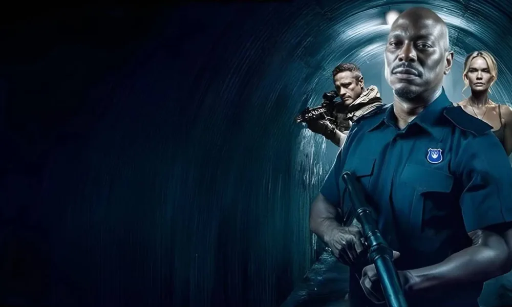 Imagem de divulgação de "Sem Saída", com protagonistas armados em um túnel. Na frente, o principal, Tyrese Gibson (Ty) olha para a câmera.