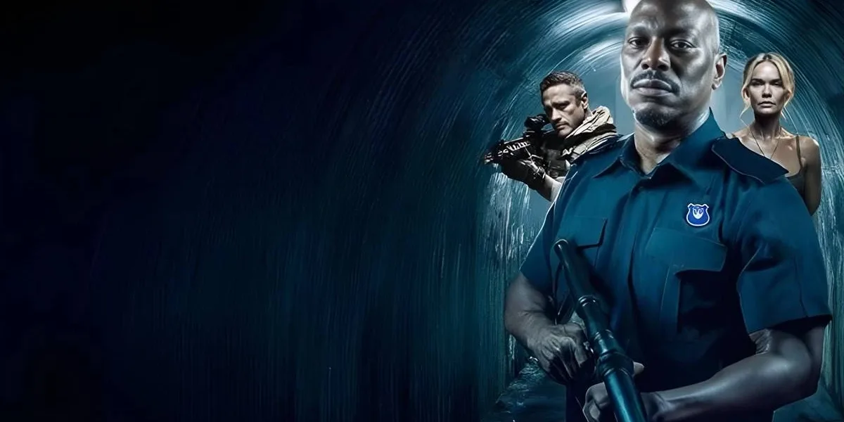 Sem Saída | Confinamento e Tensão Envolvendo Energia Nuclear Imagem de divulgação de "Sem Saída", com protagonistas armados em um túnel. Na frente, o principal, Tyrese Gibson (Ty) olha para a câmera.
