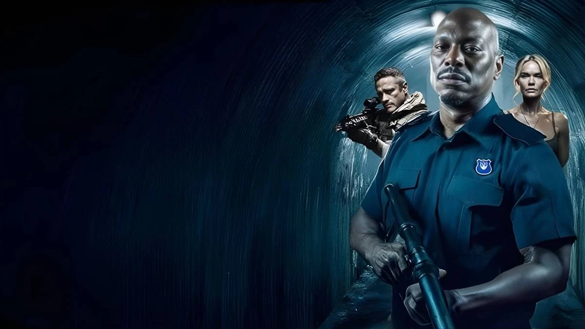 Sem Saída | Confinamento e Tensão Envolvendo Energia Nuclear 1 Imagem de divulgação de "Sem Saída", com protagonistas armados em um túnel. Na frente, o principal, Tyrese Gibson (Ty) olha para a câmera.