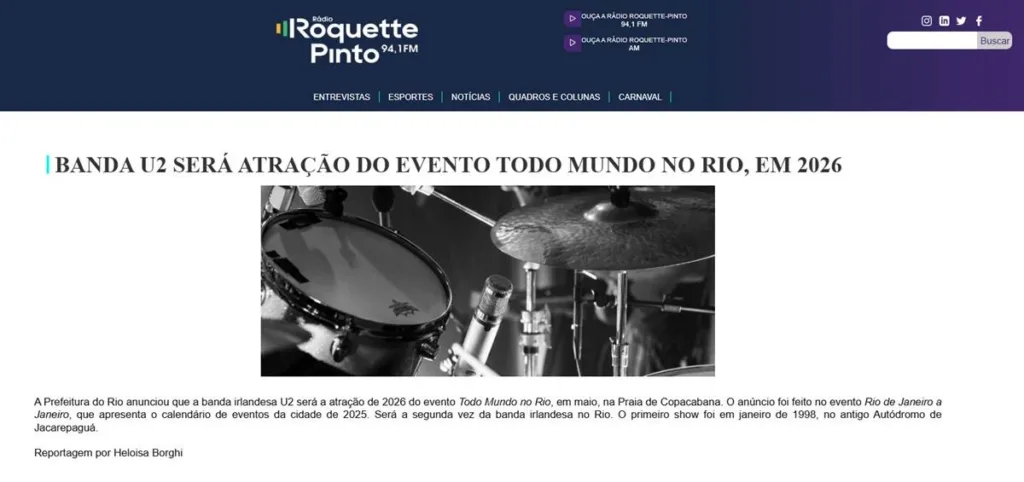 U2 | Prefeitura do Rio Confirma Show de Graça e Apaga; Entenda 1 Captura de tela do Internet Archive da agora apagada página na Rádio Roquette Pinto, veículo oficial do governo do Rio, confirmando vinda do U2 para show gratuito em Copacabana em 2026.