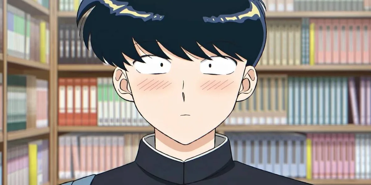 Go For It, Nakamura-kun!! | Anime Ganha Trailer e Data de Estreia Protagonista Nakamura do anime "Go For It, Nakamura-kun!" visto centralizado na tela, corado, com uma biblioteca de fundo.