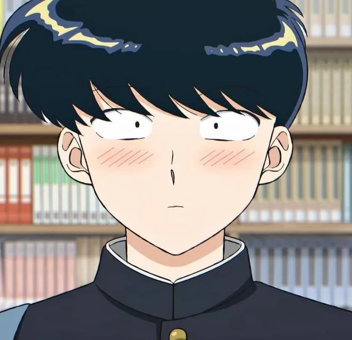 Protagonista Nakamura do anime "Go For It, Nakamura-kun!" visto centralizado na tela, corado, com uma biblioteca de fundo.