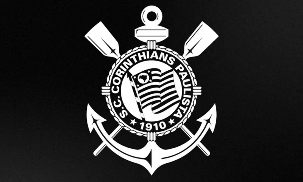 Brasão do Corinthians em branco em destaque sobre fundo preto.