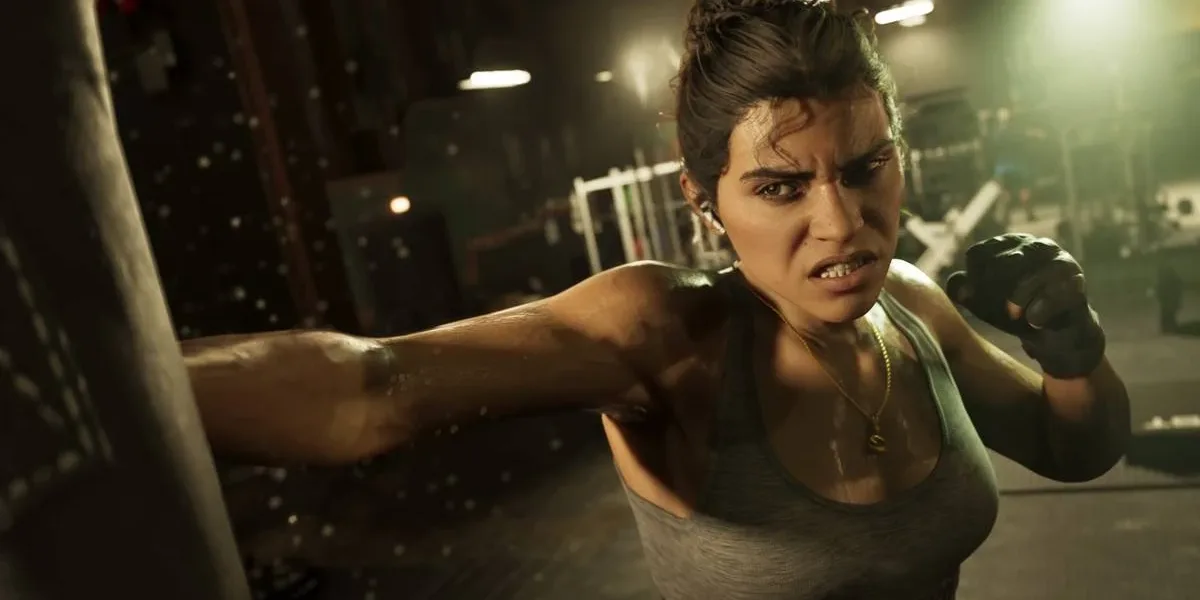BGS 2026 | Grandes Lançamentos Do Segundo Semestre Que Podem Aparecer Na Feira Esta imagem mostra Lucia, um dos personagens principais do jogo GTA VI. Ela é vista socando um saco de pancada, à esquerda da nossa tela, muito próximo da câmera do jogador.