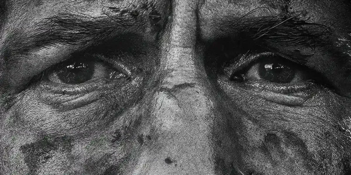 O Justiceiro: Uma Última Morte | Justiceiro Retorna ao Caos e aos Próprios Fantasmas em Especial Jon Bernthal como Frank Castle em "Justiceiro: Uma Última Morte". Imagem em escala preto e branco com foco em seus olhos desesperados.
