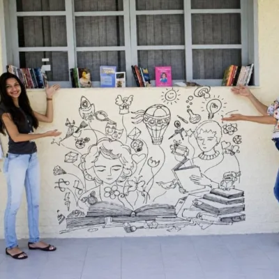 Apresentação do projeto "Livro: Liberdade para a Alma" em mural.