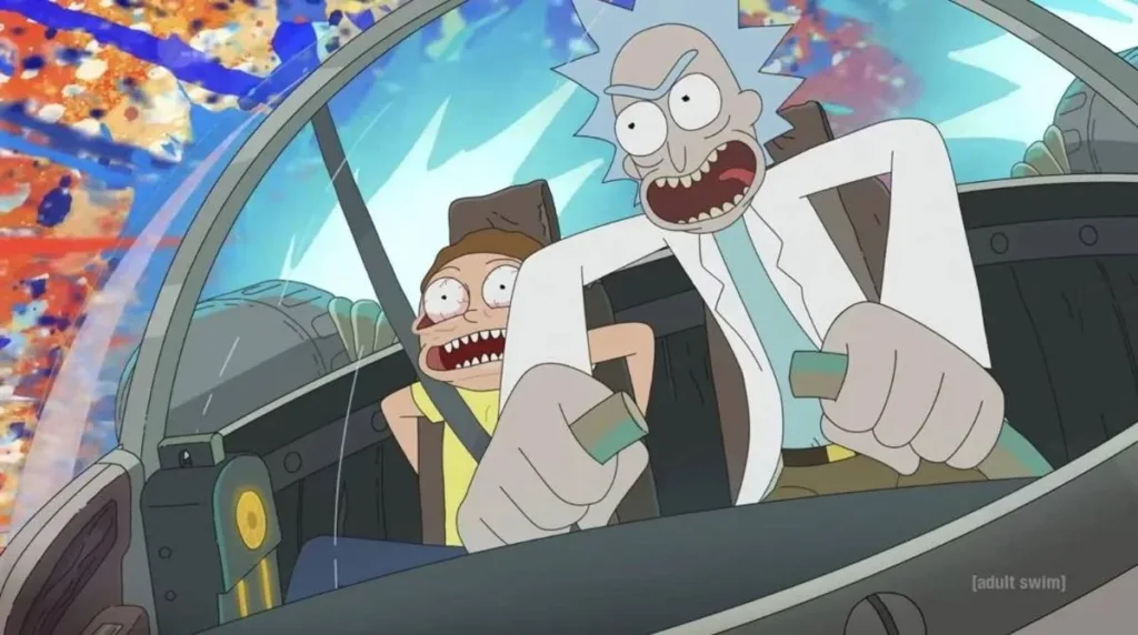 Rick and Morty pode ganhar live-action pela Warner Bros. 2 Rick Sanchez da série "Rick and Morty" dirigindo um veículo nave em alta velocidade com Morty sofrendo com o efeito da inércia.