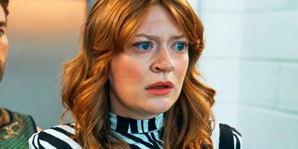 The Boys (5ª Temporada) | Entre Acertos e Excessos, Série Encerra Sua História, Com Desempenho Abaixo do Esperado 8 Colby Minifie como a Ashley de "The Boys". Rosto virado, preocupado.
